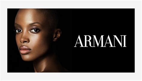 who owns armani brand